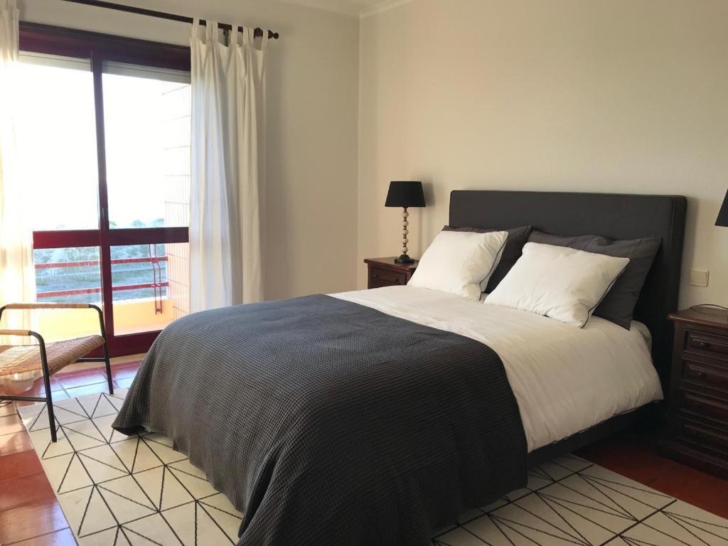 Beachfront Apartment With Swimming Pool Минделу Экстерьер фото
